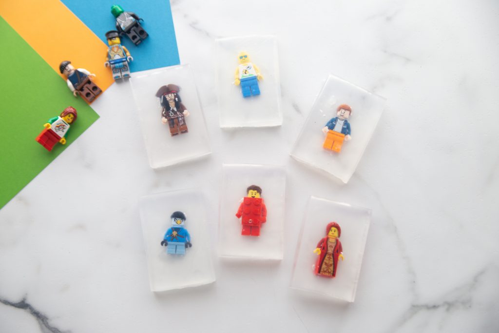 variety of lego soaps with minifigures inside